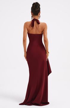 Wow them in the Luella maxi. A dress to make memories in. this halter style has a plunge neckline to frame the bust. with a flattering. body hugging fit. The look is complete with a thigh high split and ruffle detail. Pair yours with effortless waves and heeled mules.   Colour: Burgundy. Premium stretch crepe fabric. Cinches the waist and hugs the body. Plunge neckline. Halterneck. Ruffle detail. Thigh high split. Maxi length. Model is an XS and is wearing an XS. Homecoming Dresses Corset, Maxi Dress Summer, Deep V Dress, Maxi Dress Sale, Sleeveless Bodycon Dress, Bodycon Maxi Dresses, Sparkle Dress, Plunge Neckline, Dresses By Length