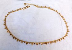 * Beautifully designed gold color belly chain. * can be used with belly dance costumes and saris. * Adjustable from 25 to 41 inches waist. * D.no.1 * D.no.2 *D.no.3 *D.no.4 Bohemian Gold Beads Waist Chain For Festivals, Bohemian Gold Waist Chain For Festivals, Traditional Gold Bridal Belt With Tilla, Bollywood Gold Bridal Belt For Festivals, Gold Bridal Belt For Festive Occasion, Temple Jewelry Style, Gold Bridal Belt For Diwali Ceremonial, Gold Temple Jewelry Bridal Belt For Festive Occasion, Traditional Gold Bridal Belt For Festivals, Festive Gold Bridal Belt In Temple Jewelry Style