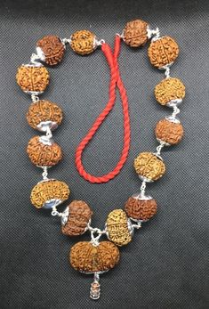 "\"For the successful achievers and ambitious people who want to reach the top level, wearing of all 1 to 14 Mukhi Rudraksha is considered auspicious by the great epics. You may get everything that you can dream of. for success in your life. This is the most powerful healing mala. According to Puranas, a person who wears Rudraksha from 1 to 14 Mukhi becomes Lord Shiva Incarnate. This mala may be worn, or kept at the altar for worship, or even carried along in a pouch. This has Rudraksha beads re Temple Necklace With Latkans And Round Beads For Festivals, Spiritual Polished Beads For Puja, Spiritual Mala With Polished Beads For Festive Occasions, Traditional Silver Mala For Meditation, Silver Spiritual Mala For Festivals, Festive Spiritual Mala With Polished Beads, Silver Mala For Festivals, Spiritual Bracelets With Latkans For Diwali, Silver Temple Jewelry Beads For Festivals