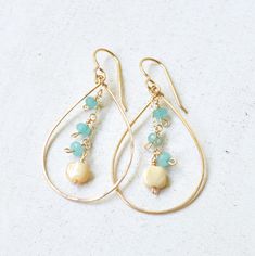 "These lovely gold teardrop earrings feature tiny aqua dyed jade and mother of pearl daintily hanging from a gold filled chain. Teardrops are made from hammered 18g gold filled wire & measure approximately 2\" in length." Gold Teardrop Earrings, Earrings Dangling, Sea Glass Pendant, Glass Pendant Necklace, Sea Glass Necklace, Jewelry To Make, Gold Earrings Dangle, Wire Earrings, Gold Drop Earrings