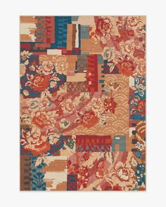 a multicolored rug with flowers on it