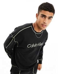 Hoodies & Sweatshirts by Calvin Klein Call off the search Crew neck Logo embroidery Contrast stitching Relaxed fit Oversized Black Sweatshirt With Embroidered Logo, Calvin Klein Casual Crew Neck Sweater, Casual Calvin Klein Crew Neck Sweater, Oversized Black Sweater With Embroidered Logo, Black Long Sleeve Sweater With Embroidered Logo, Urban Hoodie With Embroidered Logo And Crew Neck, Calvin Klein Black Winter Tops, Black Calvin Klein Tops For Winter, Calvin Klein Black Top For Winter