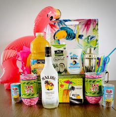 an assortment of drinks and condiments on a table