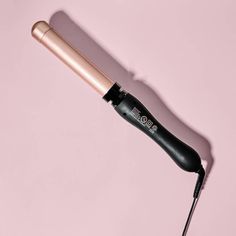 The Beachwaver B1.25 Midnight Rose is a versatile curling iron with a 1.25-inch ceramic barrel, perfect for creating loose, beachy waves or a beautiful blowout. It features 3 heat settings, a lightweight 5.5-inch barrel, simplified arrow buttons for easy rotation control, and an 8-ft swivel cord for added convenience. With its ergonomic handle and beveled, no-kink clamp, this curling iron is great for all hair types and textures, offering professional-level styling results. Key Features: • Featu Curling Iron Size, The Beachwaver, Loose Beachy Waves, Beach Waver, Rotating Curling Iron, Midnight Rose, Curling Wand, Styling Comb, Beachy Waves