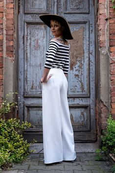 Elegant high-waisted wide leg trousers. Side-seam hidden zipper. Simply elegant culottes! Pair it with our lace over-skirt for extremely romantic, but still comfortable look! You can also wear them for casual outfits. You can also buy lace over-skirt separately. Its is made upon request, so we need 14 days to make and ship. SIZING in centimeters: XS: waist 64, hips 96, length 95 S: waist 68, hips 100, length 95 M: waist 72, hips 104, length 95 L: waist 76, hips 108, length 95 XL: waist 80, hips Elegant Fitted Wide Leg Culottes, Elegant Straight Culottes, Chic Full Length Wide Leg Pants For Wedding, Chic Full-length Wedding Bottoms, Chic Full Length Wedding Bottoms, White Wide Leg Pants For Summer Evenings, Chic White Wide Leg Pants For Wedding, White Straight Pants For Evening, Elegant High-waisted Culottes For Evening