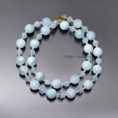 PRODUCT DETAIL : ITEM : AQUAMARINE BEADED NECKLACE ITEM CODE : DGC4103 ITEM NAME :NECKLACE GEMSTONE : BLUE AQUAMARINE BEADS SHAPE : SMOOTH ROUND LENGTH : 18 INCH APPROX BEADS SIZE: 2mm/6mm/10 mm APPROX WEIGHT : 214 Cts. APPROX CUSTOMIZATION/BULK ORDER : AVAILABLE PLEASE FEEL FREE TO CONTACT IF YOU REQUIRE ANY FURTHER INFORMATION. Aquamarine Necklaces With Round Beads Of Natural Stones, Aquamarine Necklace With Round Natural Stone Beads, Aquamarine Necklace With Natural Round Beads, Aquamarine Necklace With Round Natural Stones, Aquamarine Gemstone Round Bead Necklaces, Aquamarine Gemstone Necklaces With Round Beads, Aquamarine Gemstone Beaded Necklace, Light Blue Gemstone Round Beads Jewelry, Light Blue Gemstone Jewelry With Round Beads