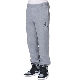 AIR JORDAN Boys Fleece Sweat Pants  Size: Boys Large He’ll be ready to rule the court in the soft and cozy Jordan Boys’ Jumpman Fleece Pants.  These cozy bottoms feature an elastic waistband with drawcord and convenient pockets for storage. The Jordan Boys Fleece Pants are made of soft fleece for all-day warmth and comfort. Product Details Elastic waistband with adjustable drawstrings  Embroidered JORDAN Jumpman logo  Dual Side Pockets & 1 Rear  Right Pocket  Jogger cuffs  Stretch fabric for ult Nike Sweatpants For Sports Season Streetwear, Nike Cotton Sweatpants For Winter, Nike Sweatpants For Winter Jogging, Nike Sporty Pants For Winter, Sporty Fleece Sweatpants For Streetwear, Nike Cotton Winter Joggers, Nike Winter Jogging Sweatpants, Fleece Sweatpants For Streetwear During Sports Season, Nike Sweatpants With Ribbed Cuffs For Streetwear