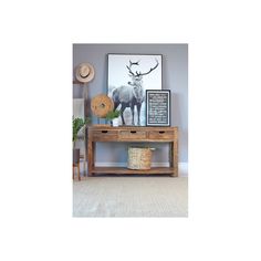 Natural wood grain accents add rustic appeal to this classic, wooden console table. Crafted with gorgeous sheesham wood, it's a sturdy and stylish addition to any home. Three slide-out drawers on wooden glides offer versatile storage space. A spacious open shelf down below adds even more convenience. Place this wooden console table in an entryway or den to add charm and personality to your decor.. Three pull out drawers with wooden glides and bottom storage shelf, Assembly Required:No, Collectio