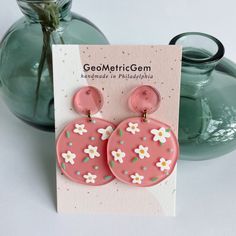 "Bella Earrings. Statement yet lightweight earrings. Made from a durable acrylic and surgical steel posts ( safe for sensitive ears). Approx. measurements. 2\"L x 1.5\"W. Handmade in Philadelphia." Earring Clay, Flowers Daisy, Free Shapes, Pink Round, Acrylic Jewellery, Earring Ideas, Lightweight Earrings, Round Design, Earrings Statement