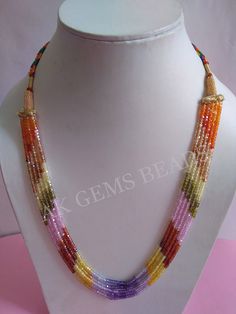 PRODUCT DETAILS: 5 Strands AAA Multi Cubic Zirconia Faceted Rondelle Semi Precious Beaded Gemstone Jewelry Necklace For Woman Stone Name :- Cubic Zirconia ( Blue, Yellow, Red, Pink, Green, Brown ) Bead Size :- 3mm Length :- 13 to 15 Inches Bead Shape :- Rondelle Bead Type :- Faceted Quality :- AAA (Excellent) Treatment :- Natural 2. NECKLACE LENGTHS :- 1st Strands :- 13 Inches 2nd Strands :- 13.5 Inches 3rd Strands :- 14 Inches 4th Strands :- 14.5 inches 5th Strands :- 15 inches More Fine Shop G Collar Rosa, Necklaces For Girls, Indian Things, Wholesale Necklaces, Gemstone Beads Wholesale, Zircon Necklace, Gemstone Beads Jewelry, Zirconia Necklace, Blue Yellow Red