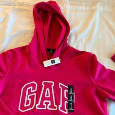 Never Worn Sweatshirt Hoodie By Gap. Size M Bubble Gum Pink Color. Has A Hood And A Front Pocket Gap Hoodie Sweatshirt With Adjustable Hood, Sporty Gap Sweatshirt For Spring, Gap Hooded Tops With Ribbed Cuffs, Sporty Gap Hoodie For Spring, Gap Cotton Crew Neck Hoodie, Gap Casual Sweatshirt With Adjustable Hood, Fall Hooded Top With Logo Print, Gap Tops With Drawstring Hood For Fall, Sporty Gap Sweatshirt With Adjustable Hood