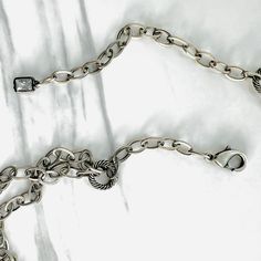 Our Sienna has been so popular we decided to add another version, one with a bit more sparkle ✨ Decorative connector and faceted pyrite beads embellish the antique silver double chain. Measures 20” in length, lobster clasp closure allows you to adjust length. All metals are electroplated with decorative finish free from cadmium, lead, and nickel. Tarnish resistant coating. Gunmetal Jewelry With Lobster Clasp In Metal, Elegant Pewter Necklace In Antique Silver, Elegant Antique Silver Pewter Necklace, Adjustable Double Strand Silver Chain Necklace, Elegant Silver Pewter Necklace, Silver Multi-strand Oxidized Jewelry, Silver Double Strand Necklace With Sterling Clasp, Silver Double Strand Cable Chain Necklace, Silver Double Strand Necklace With Cable Chain