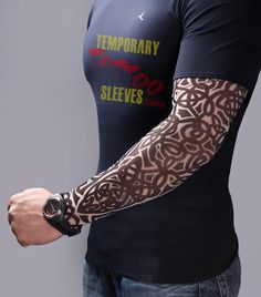 a man with tattoos on his arms and arm sleeves