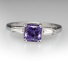 This elegant ring is centered with a square radiant cut no heat sapphire with Tanzania origin that we sourced and set in an elegant platinum diamond mounting. This ring is currently a size 7. Sapphire Diamond Engagement Ring, Engagement Ring Platinum, Diamond Sapphire Engagement Ring, Sapphire Diamond Engagement, Purple Sapphire, Engagement Rings Platinum, Baguette Cut Diamond, No Heat, September Birthstone