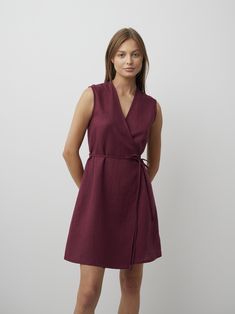 "BROOKE is an elegant sleeveless mini wrap dress. DETAILS - True wrap closure - Sleeveless design - Mini length - Oeko-Tex certified 100% local washed midweight linen - Cut and sewn to order just for you in our studio COLOR - Eggplant, you can also choose other colors above - Fabric samples are available here https://www.etsy.com/listing/586569696/linen-fabric-samples SIZING & FIT - Fit true to size - Model is 5'10\" / 178cm tall and wears size S CARE FOR LINEN - Machine wash up to 30ºC/86ºF gentle cycle - Lay flat to dry or tumble dry low - Warm iron if needed - Do not bleach SIZE GUIDE Size conversion guide Size XS (US 0-2, IT 36-38, UK 4-6, Japan 3-5, France 32-34) Size S (US 4-6, IT 40-42, UK 8-10, Japan 7-9, France 36-38) Size M (US 8-10, IT 44-46, UK 12-14, Japan 11-13, France 40-42) Feminine V-neck Linen Dress, Fitted Knee-length Linen Wrap Dress, Casual Linen V-neck Mini Dress, Summer Linen Mini Dress With V-neck, V-neck Linen Dress With Adjustable Straps, Linen Wrap Dress, Sleeveless Linen Dress, Mini Wrap, Studio Color