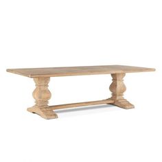 a large wooden table with two legs