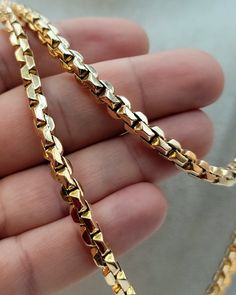 --- Crafted in GUARANTEED HIGH-QUALITY 18-Karat GOLD -- Pure Gold Material, Not Gold-Filled or Plated --- At a 6 millimeter thickness this chain is available in 20.75" to 24.75" lengths. 20.75 inches - 6 mm : 22.26 gr (grams weight) 22.75 inches - 6 mm : 25.99 gr 24.75 inches - 6 mm : 28.28 gr Closure: Lobster Claw ( Strong and Durable ) Chain style: 18K Gold Box Chain  * A gold Box chain necklace is an accessory that instantly takes your style to the next level; Wear it all day, Everyday. it's Luxury Gold Plated Box Chain Necklaces, Men’s Gold Chain, Box Chain Gold Men, Men’s Gold Chain Necklace, Royal Gold Chains For Men, Mens Gold Chain Necklace, Luxury Gold-tone Tarnish Resistant Chain Necklace, Gold Pendants For Men, Gold Necklace For Men