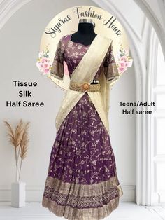 Elegant Tissue Half saree in elegant deep purple color with vibrant Dupatta with work. size :38 height:41 in Purple Silk Sharara For Navratri, Purple Anarkali Set With Traditional Drape, Purple Georgette Pre-draped Saree For Eid, Elegant Purple Tissue Silk Pre-draped Saree, Festive Purple Silk Pre-draped Saree, Purple Tissue Silk Pre-draped Saree With Sheer Dupatta, Bollywood Style Purple Pre-draped Saree For Wedding, Elegant Purple Pre-draped Saree, Purple Sharara With Cutdana And Traditional Drape