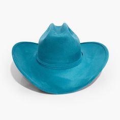 Cerulean Cowboy Hat by AB.LINO Western meets contemporary. Our take on a western classic, made from the same materials used on our flagship rancher hat. Trimmed with a Minimal Mexican Suede Hat Band. Made from stiffened Mexican suede Spot / specialist clean Brim width: 4″ / 10.16 cm Crown height: 4″ – 4.75″ Rigid crown design Please note: due to the color and nature of the suede dyeing process, some flecking or marks may be present in material Size & Fit: Our Cowboy hat is designed one-size-fits Western Style Blue Felt Hat For Kentucky Derby, Western Blue Hat Bands For Ranch, Blue Country Style Hat Band For Ranch, Blue Western Hat For Rodeo, Flat Brim Blue Hats For Ranch, Blue Short Brim Hat For Ranch, Blue Flat Brim Hat For Ranch, Blue Wide Brim Hat For Ranch, Suede Hat