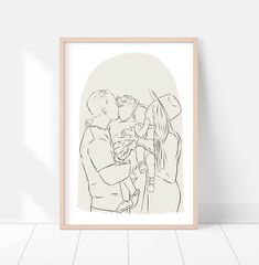 a black and white drawing of two people holding a baby in front of a wall