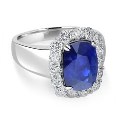 A perfect complement to your luxury look, this ring is crafted from 18k white gold. Set with a long cushion-cut Sapphire and sparkly round Diamonds, the ring adds luxury to your look and is perfect for big and small occasions. Product Information SKU J19780 Metal Type 18K Metal Color White Gold Ring Style Halo Primary Stone Gemstone Name Sapphire Gemstone Species Corundum No. Of Gemstones 1 Gemstone Shape Long Cushion Gemstone Color Royal Blue Gemstone Grade - Gemstone Clarity - Gemstone Weight Gia Certified Cushion Cut Sapphire Ring In Platinum, Gia Certified Cushion Cut Sapphire Ring In White Gold, Platinum Diamond Ring With Cushion Cut For Formal Events, Platinum Cushion Cut Diamond Ring For Formal Events, Cushion Cut Platinum Diamond Ring For Formal Occasions, Formal Platinum Diamond Ring With Cushion Cut, Luxury Cushion Cut Sapphire Diamond Ring, Fine Jewelry Sapphire Ring With Cushion Cut, Formal 14k White Gold Cushion Cut Diamond Ring