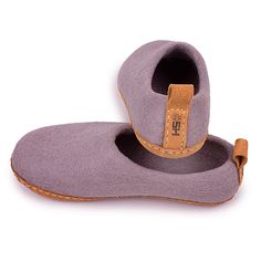 Experience the ultimate comfort and warmth with Haussimple's handmade wool indoor slippers, crafted from premium natural merino wool and finished with a durable leather sole. These bedroom house slippers provide a cozy, breathable fit, making them perfect for everyday use around the house. Designed with simplicity and timeless elegance, they are ideal for anyone seeking a comfortable and stylish solution to cold floors. Sustainably made with eco-friendly materials, these slippers are a thoughtful choice for self-care or as a gift for someone special. Features & Benefits: Handmade Quality: Each pair is carefully crafted from natural merino wool, ensuring softness, durability, and unique charm. Leather Sole: Provides a strong, comfortable base that grips various surfaces, making them safe an Sheep Felt, Women Bedroom, Wool Shoes, Bedroom Slippers, Winter Comfort, Indoor Slippers, Clothing Sites, Woman Bedroom, Felted Slippers