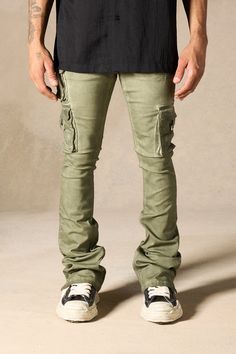 SERENEDE® "OIL" cargo stacked jeans feature our signature stretch material for a comfortable feel. Olive wash* with a slight tint of green. SERENEDE® signature skinny fit construction with a stacked ankle. This unique style features multiple cargo pockets. Designed to be individually unique. DETAILED FEATURES: OLIVE wash [ slight tint of green ] Cargo pockets Stacked finish Fading throughout Signature "leather" waistband label SERENEDE® branded hardware Five-pocket styling Zipper fly 5.5" W Ankl Urban Green Jeans With Pockets, Urban Green Cargo Jeans With Hip Pockets, Khaki Cargo Style Jeans For Streetwear, Urban Khaki Jeans For Streetwear, Urban Style Khaki Jeans For Streetwear, Fitted Utility Cargo Jeans With Five Pockets, Urban Green Cargo Jeans, Urban Green Cotton Cargo Jeans, Military Cargo Style Jeans For Streetwear