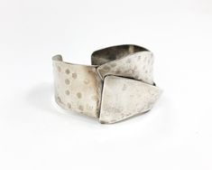 "~ 1970s nice quality wide silver bracelet ~ Hammered silver look cuff ~ Folded over band ~ Unmarked and probably an alloy ~ Very nice Width- 1.5\" (3.81 cm) More Incredible Jewelry: glennasvintageshop.etsy.com Additional Vintage in our sister shop Glenna's Jewels: glennasjewels.etsy.com Instagram @glennas_clothing Facebook https://www.facebook.com/glennasclothing" Gold Link Bracelet, Pretty Bracelets, Rhinestone Bracelet, Green Enamel, Hammered Silver, Silver Cuff Bracelet, Silver Rhinestone, Bracelet Silver, Silver Cuff