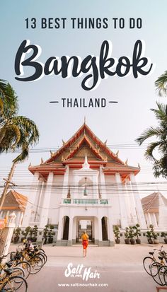 a white building with palm trees and the words 13 best things to do in bangkok thailand