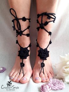 BLACK FLORAL BAREFOOT SANDALS Hand croched, black barefoot sandals with big flower on foot and very decorative flower strings to tie on the leg. Very elegant, eye catching pattern. Made of 100% thickner cotton, stitched with precision in every detail. They are ideal for summer on the beach, yoga as a beautiful decoration on feet. One size fits all. Fabric and care: - 100% classic cotton - hand wash - shape and dry flat to hold the shape - after drying can olso steam flowers on string with an iro Adjustable Crochet Open Toe Sandals, Adjustable Crochet Open-toe Sandals, Crochet Open Toe Beach Sandals, Crochet Open Toe Sandals For Beach, Beach Sandals With Crochet And Round Toe, Beach Crochet Sandals With Round Toe, Crochet Sandals With Round Toe For Beach, Crochet Round Toe Sandals For Beach, Crochet Sandals For Beach