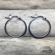 "The perfect everyday accessory, these glistening hoop earrings are made from 925 Sterling Silver. if you want something not too small or not too big, this is perfect for you! These hoops are 0.78\" (20mm) in length and width. SOLD AS A PAIR For more Silver Earrings: http://etsy.me/2AJWHDP ENTER MY SHOP HERE: KalismaBijoux.etsy.com HANDMADE by ME - All my work is crafted with the utmost care in my studios - in Madrid, SPAIN CHANGES Don't hesitate to contact me if you have an idea or request. ABO Classic Adjustable Hoop Earrings, Classic Adjustable Hoop Earrings For Pierced Ears, Classic Adjustable Hoop Earrings For Everyday, Adjustable Classic Hoop Earrings, Minimalist Small Hoop Earrings For Anniversary, Modern Hoop Earrings With Simple Design, Modern Nickel-free Hoop Earrings For Everyday, Modern Hoop Huggie Earrings With Ear Wire, Adjustable Small Hoop Beaded Earrings