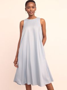 Meet your new floaty swing dress. Crafted in a wrinkle-resistant and super soft lightweight fabric, this midi can be dressed up with gold jewelry and wedges or down with sandals and a tote. | J.McLaughlin Women's Anita Dress Frost Blue, Size XS Chic A-line Maxi Dress For Daywear, Chic Silk A-line Sleeveless Dress, Elegant A-line Flowy Sleeveless Dress, Chic Knee-length Sleeveless Silk Dress, Versatile Flowy Summer Dress, Chic Silk Sleeveless A-line Dress, Chic Silk Midi Dress For Day Out, Summer A-line Silk Midi Dress, Versatile Summer Evening Dresses