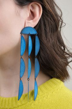 These stunning Rain Blue Earrings are carefully crafted by hand for a lightweight and comfortable fit. Their unique beautiful blue color adds a special touch to any outfit. Earrings Shapes, Moma Shoes, Annie Costello Brown, Rain Blue, Patina Earrings, Farmhouse Pottery, Tassel Scarf, Bar Accessories, Knit Tees