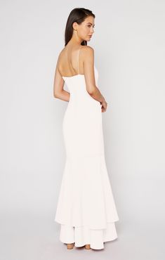 Juxtaposing the simple straight neck and straps, this flowy, double-tiered, mermaid-style gown will make a statement at every formal event.The Aurora Gown in white is a "soft white". Fit Details FittedLinedFit-and-flare silhouetteZipper and button closure on backDouble layer ruffle hem73% Polyester 22% Rayon 5% Spandex Dry Clean Only ImportedMeasurementsLength: 62.75in/159.39cm, from top edgeMeasurements from size 4 White Graduation Dress Long, Spring Formal Dresses Long, White Formal Dress Long, Long White Flowy Dress, White Long Dresses, Aurora Gown, Prom Dresses Long Elegant, White Formal Gowns, Spring Formal Dresses