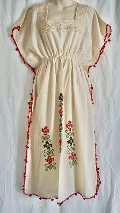 One Size. This is an Authentic Turkish hand sewed loose flowy women summer dress made with 100% cotton. Made from a special handmade garment in Turkey for over 150 years called "Sile Bezi".  + It's a long loose flowy ivory color dress with red and black Turkish flower motifs.  + It has a stretchable waist for comfort and look + For best fit please see below for fit measurements + Please note that the dress comes with special washing instructions. It's perfect for hot summer days. It's very light Handmade Tunic Summer Dress, Handmade Summer Tunic Dresses, Handmade Tunic Dresses For Summer, Natural Cotton Bohemian Dress, Red Cotton Bohemian Dress, Red Cotton Boho Dress, Handmade Dresses For Spring Vacation, Handmade Cotton Vacation Dresses, Handmade Cotton Dresses For Vacation