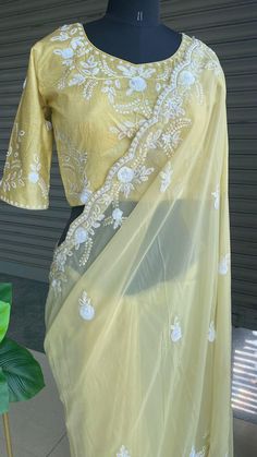 Product Descriptions : Body hugging mint organza saree with embroidery border works is paired up with mint silk embroidery worked blouse. Top Kurti Design, Silk Embroidery Blouse, Organza Saree With Embroidery, Yellow Organza Saree, Worked Blouse, Kurti Top, Embroidery Border, Banana Yellow, Dress Flats