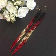 "These black red gold long fringe bead earrings pair amazingly with any outfit, dressy or casual. They are made of high-quality Czech colored beads with steel . Colors: black red gold Length: 7 inches (17.5 cm) Width: 0.5 inches (1 cm) Materials: Czech \"Preciosa\" beads Durable synthetic thread" Extra Long Earrings, Turquoise Bead Earrings, Beaded Jewelry Earrings, Beaded Earrings Diy, Brick Stitch Earrings, Handmade Earrings Beaded, Beaded Earrings Patterns, Sparkle Earrings, Earring Patterns