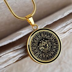 "This Aztec Mayan Calendar Necklace Is the Perfect Gift for all those Mayan lovers, Whether for Yourself or a Loved One.  Explore all our Witchcraft jewelry here: https://www.etsy.com/in-en/shop/SymbolicPresent?ref=seller-platform-mcnav§ion_id=22613465 ➜ Our jewelry is made of high-quality surgical steel with a shatterproof liquid glass coating and an 18k gold finish option. ➜ Engrave onto the back of the Aztec Mayan Calendar pendant your loved one's name, your wedding date, an anniversary, or a Symbolic Stainless Steel Medallion Jewelry, Stainless Steel Round Amulet Jewelry, Vintage Stainless Steel Box Chain Jewelry, Spiritual Stainless Steel Jewelry, Spiritual Stainless Steel Jewelry Round Shape, Handmade Stainless Steel Medallion Jewelry, Stainless Steel Amulet Necklace For Gift, Spiritual Stainless Steel Locket Jewelry, Spiritual Round Stainless Steel Necklaces