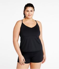 Paddle, swim or soak up the sun in a swimsuit designed for it all. This fresh, flattering tankini offers non-stop support and a just-right fit for all-day comfort in and out of the water. From strap joint at neck to hem is 18". Fitted: Sits close to the body. Falls at high hip. In a quick-drying blend of 82% recycled nylon and 18% Lycra®. Lining in a soft blend of 95% polyester and 5% spandex. Abrasion-resistant fabric stays in good condition after multiple washes and wears. UPF 50+ fabric block Summer Yoga Tank Top With Built-in Bra, Workout Top With Built-in Bra, Triangle Shape, Sleeveless Tankini With Built-in Bra For Poolside, Summer V-neck Stretch Activewear, Triangle Top With Built-in Bra For Pool, V-neck Swimwear With Built-in Bra For Poolside, Athleisure Swimwear With Built-in Bra For Poolside, V-neck Swim Dress With Built-in Bra, Sporty Beach Tank Top With Built-in Bra