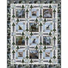 a quilt with pictures of animals and trees on the front, along with words that read be wild