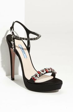 PRADA Jeweled Black Satin Platform Sandal Pump Heels 100% Authentic Guaranteed or your money back! Retails for $1,300+   Description: Prada makes it possible to look perfectly polished with their elegant collection of shoes that will keep your feet looking pretty. Size: 39.5 / 9-9.5 Color: Black Satin Ajustable strap with buckle closure. Approx. heel height: 5" with 1" platform height. Approx. insole length: 10 2/8"  Fabric upper Leather lining & sole Made in Italy Condition:   Brand NEW with Bo Platform Stiletto Heels, Prada Heels, Chic High Heels, Prada Shoes Heels, Boot Heels, Expensive Shoes, Black Platform Sandals, Black Jewel, Italian Shoes