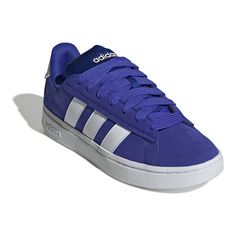 Sleek, sporty and so easy to style. These adidas sneakers won't spend much time in your shoe rack. The faux leather upper is emblazoned with the 3-Stripes, adding an athletic edge to any outfit. Whether you're trekking across the city or taking it easy with friends, the adidas heritage shines through.Click this FOOTWEAR GUIDE to find the perfect fit and more! TECHNOLOGIES & FEATURES Cloudfoam midsole cushions your step Classic rubber outsole keeps you grounded day to day Soft lining hugs the foo Adidas Grand Court Alpha, Tennis Vibes, Dr Martens Style, Martens Style, Keds Style, Adidas Grand Court, Bridal Wedding Shoes, Modern Elements, Trending Sneakers