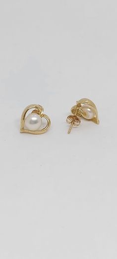 Heart 14k Yellow Gold WHITE Pearl Stud Earrings. Freshwater White Pearl 14k Solid Yellow Gold Earring. Wedding Pearl Earrings. Pearl LOVER. Earring. Product Info:                                                -Earring dimensions: 10mm x 10mm. -Stones: Freshwater Pearls. -Pearl Size :4mm -Stone Numbers: 2 -Metal: 14k  -Finish: Yellow Gold.  -Closure: Push back -Made in USA. -Nice Gift box is included. White Gold Earrings Stamped 14k For Anniversary, White Gold 14k Stamped Earrings For Anniversary, Pear-shaped White Bridal Earrings For Anniversary, White 14k Gold Earrings For Anniversary, Pear-shaped Jewelry For Valentine's Day Anniversary, Gold Pearl Earrings For Anniversary On Valentine's Day, Valentine's Day Gold Pearl Earrings For Anniversary, White Gold Earrings For Wedding On Valentine's Day, Elegant Heart Earrings For Anniversary On Mother's Day