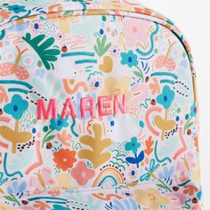 A floral backpack that's extra comfy and ready to handle daily adventures. Patterned with a colorful collection of garden friends that flit and flutter over the white exterior, the kids' large knapsack is constructed of supremely durable polyester made from recycled water bottles. A roomy interior holds everything your kid needs-books, school supplies, extra layers-and there's a padded pocket to keep their tablet protected. Outside pockets hold snacks, water bottles and more. Pair this book bag White School Backpack For Spring, White Backpack For Spring, Playful Bags For Spring Playtime, Spring Floral Print Standard Backpack, Floral Print Backpack For School In Spring, Cute School Backpack For Spring, Green Standard Backpack For Spring, Green Spring Standard Backpack, Cute Standard Backpack For Spring