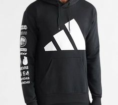 AUTHENTIC ADIDAS GRAPHIC HOODIE EA0370 70% COTTON 30% POLYESTER Adidas Sportswear Hoodie With Ribbed Cuffs, Adidas Athleisure Hoodie With Ribbed Cuffs, Black Logo Sweatshirt For Spring, Black Sweatshirt With Logo Detail For Spring, Fall Logo Sweatshirt In Athleisure Style, Adidas Activewear For Streetwear, Adidas Sportswear Hoodie With Three Stripes Branding, Adidas Sportswear Sweatshirt With Drawstring Hood, Sporty Logo Print Hoodie For Winter