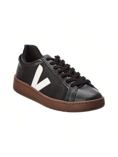 Introducing the VEJA Urca Sneaker, the must-have footwear for the environmentally conscious fashionista. Make a style statement while supporting a brand that's making a difference in the world. These black and white faux leather sneakers feature logo accents, a lace-up closure, and a lightly padded insole for all-day comfort. The rubber sole provides traction for any urban adventure. Imported and available in European sizes, be sure to reference the size chart for US conversions. Step out in sty Urban Adventure, Casual Sneakers Women, Environmentally Conscious, Style Statement, Casual Shoes Women, Sneakers Black, Leather Sneakers, Sports Equipment, A Style