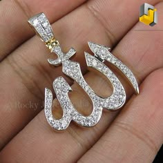 welcome to rockyjewelsindia Product Detail Item Number MJR(P)-130 Silver Weight 8.00gm Diamond Weight 1.05ct Gross Weight 8.00gm Size 45mm Allah Pendant, Pearl Diamond Pendant, Diamond Pendant Jewelry, Islamic Jewelry, Pave Jewelry, Ayatul Kursi, Pendant Diamond, Jewelry Cleaning Solution, Gold Link Chain