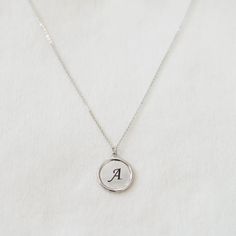 "These minimalist necklace make a contemporary, elegant addition to any ensemble! A custom engraved initial disc necklace would make a perfect gift for yourself and your loved ones. This beautiful and delicate necklace is the perfect layering or beautiful on its own. D E T A I L S - Embellished Disc with a slightly hammered surface - Disc size: 18mm x 18mm - Custom engraved initial - Handmade to order - This listing is for ONE necklace. - Each piece or set comes in a gift box, ready for gifting. Minimalist Personalized Initial Necklace For Her, Personalized Minimalist Initial Necklace For Her, Minimalist Personalized Initial Necklace Gift For Her, Personalized Minimalist Initial Necklace Gift For Her, Silver Minimalist Personalized Initial Necklace, Customizable White Gold Initial Pendant Necklace, Classic Adjustable Initials Necklace, Silver Minimalist Initials Name Necklace, Minimalist Silver Initials Name Necklace