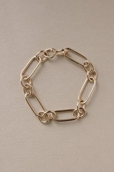 Bold yet timeless, our Roma Link Bracelet is the perfect piece for those who love a modern take on a classic look. Our completely handmade and soldered long and short links look stately resting at your wrist. Hand forged hook closure blends in seamlessly. The links of the Roma are completely formed & soldered in-studio in sterling silver or 14k gold. To finish the gold vermeil styles, we send our sterling Romas to Rhode Island where a 2nd generation family business heavy plates them in 100mi Figaro Necklace, Burlington Vermont, Figaro Chain Necklace, Daisy Earrings, Demi Fine Jewelry, Agate Ring, Family Business, Hand Forged, Rhode Island