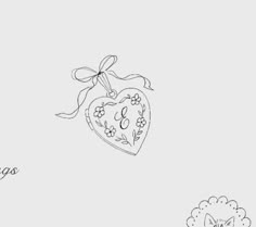 a drawing of a heart with flowers on it and the words i love you in spanish